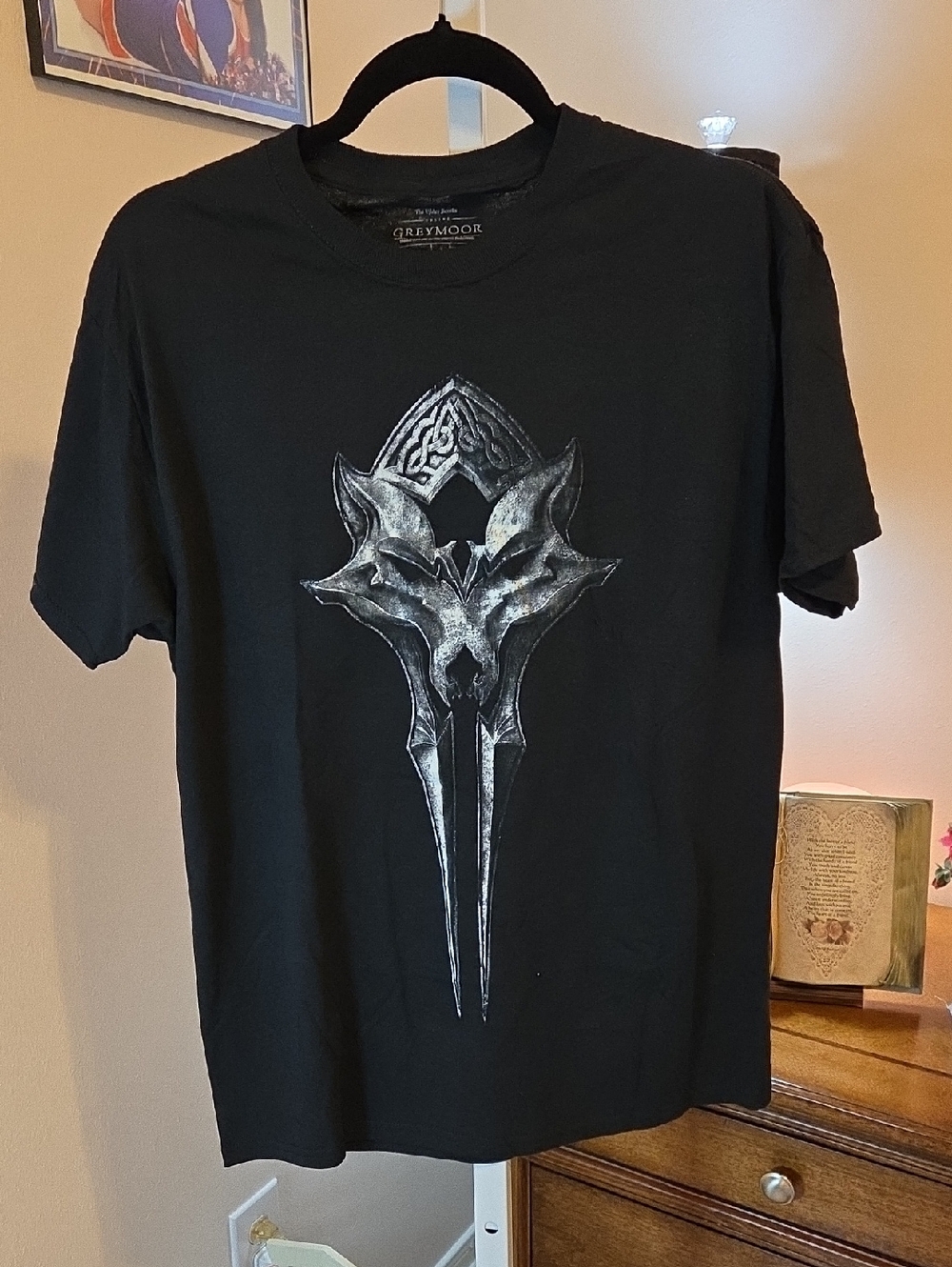 Men's Black Short-Sleeve Graphic Tee with Metallic Emblem
